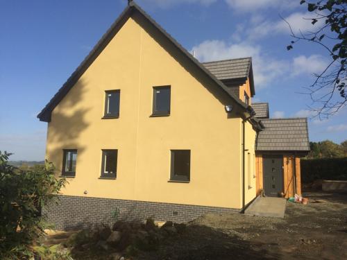 New build Harloup House after 1