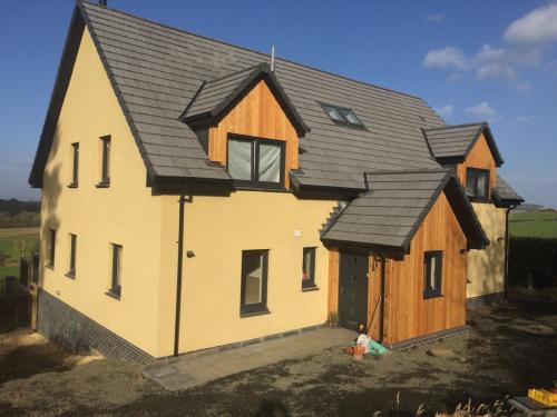 New build Harloup House after 2